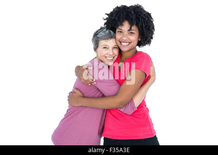 Portrait of happy daughter hugging mother Stock Photo