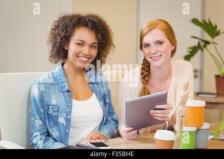 Businesswomen using digital tablet Stock Photo