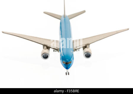 Die-cast metal 1/200th scale model of A320 airbus in the Dutch airline, KLM colours, blue and white. Plain white background with some underlighting. Stock Photo
