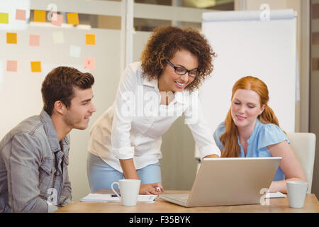 Business people using laptop Stock Photo