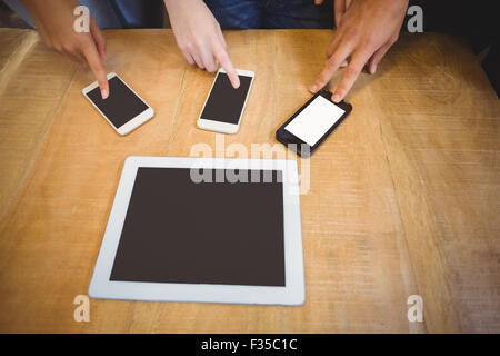 Business people using technologies Stock Photo