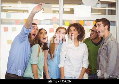 Business people taking selfie Stock Photo