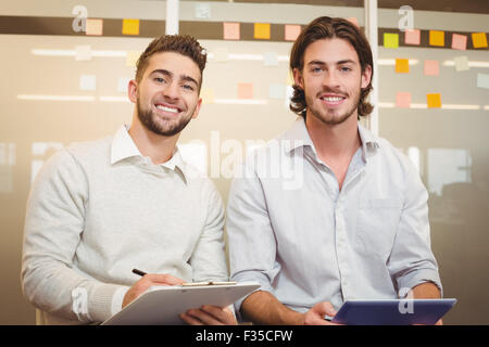 Portrait of businessmen in meeting Stock Photo