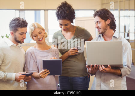 Creative team using tablet pc in office Stock Photo