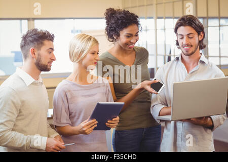 Business team using laptop in office Stock Photo
