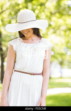 Happy young woman in sun hat Stock Photo