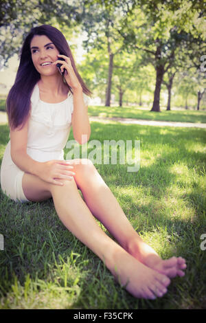 Pretty woman talking on smartphone Stock Photo