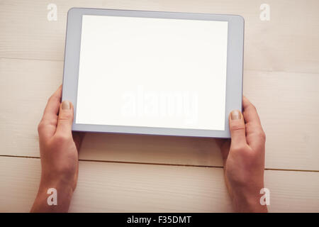 Hands holding blank screen tablet Stock Photo