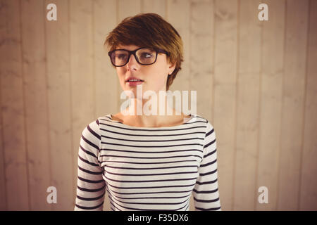 Young woman wearing striped clothes posing Stock Photo