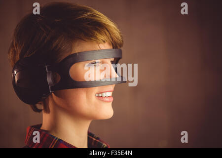 Pretty young woman wearing headphones Stock Photo