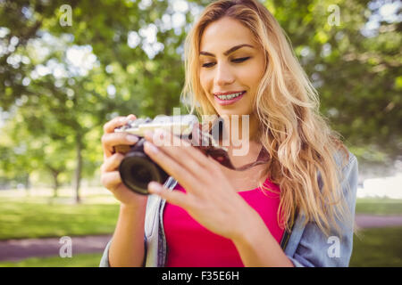 Smiling woman looking at camera Stock Photo