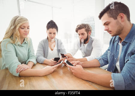 Business people using smartphones Stock Photo