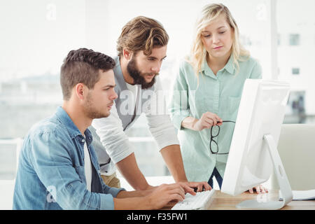 Business people working on computer Stock Photo