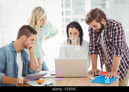 Creative business people working on laptop Stock Photo
