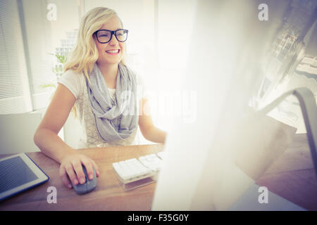 Happy woman using computer Stock Photo