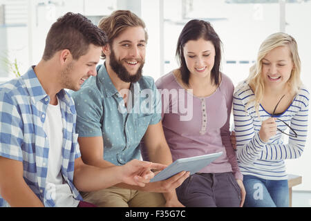 Man using digital tablet Stock Photo