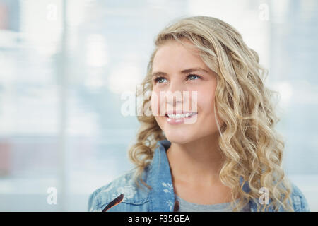 Smiling woman looking away Stock Photo