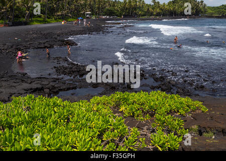 Punaluu Black Sand Beach is one the most famous black sand beaches in Hawaii.  Located on the Kau coast Stock Photo