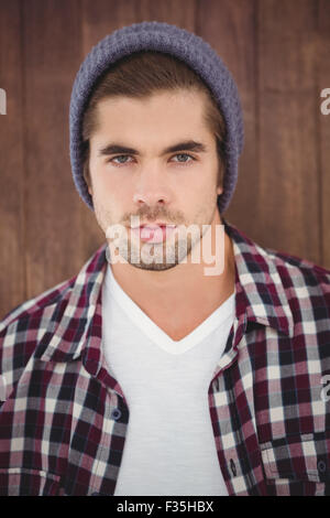 Portrait of confident man wearing knitted hat Stock Photo