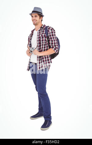 Happy man holding camera Stock Photo