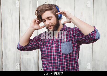 Hipster wearing headphones Stock Photo