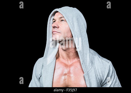 Thoughtful man looking up Stock Photo