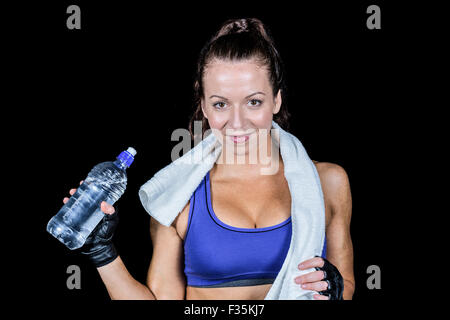 Portrait of pretty smiling woman with water bottle Stock Photo - Alamy