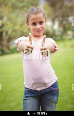Girl Student With Thumbs Up Stock Photo - Alamy