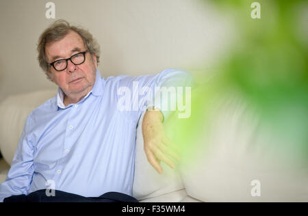 (FILE) - An archive picture dated 11 December 2013, shows German journalist and literary critic Hellmuth Karasek posing after an interview in Hamburg, Germany. Karasek died 29 September 2015 at age 81, his family in Hamburg, Germany, confirmed his death. Photo: Angelika Warmuth/dpa Stock Photo