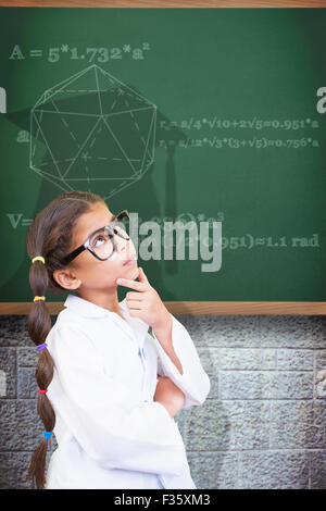 Composite image of cute pupil dressed up as scientist Stock Photo