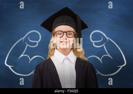 Composite image of cute pupil in graduation robe Stock Photo