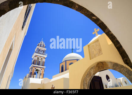 Framed arch views of St. John the Baptist Cathedral in Fira, Santorini, Cyclades, Greece Stock Photo