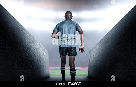 Composite image of rear view of athlete Stock Photo