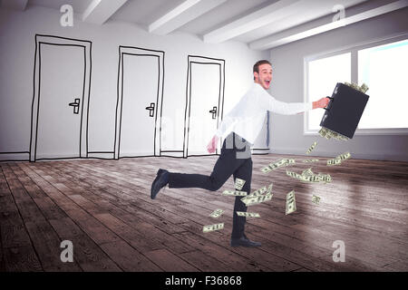 Composite image of running businessman Stock Photo
