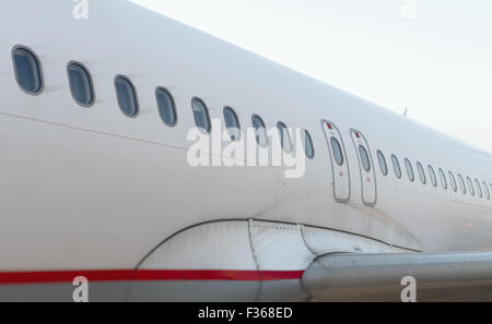 Passenger aircraft windows. View from outside. Stock Photo