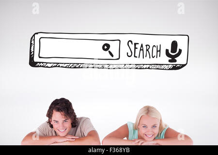 Composite image of smiling couple leaning on a whiteboard Stock Photo