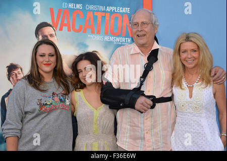 LOS ANGELES, CA - JULY 27, 2015: Chevy Chase & wife Jayni Chase & daughters Emily Evelyn Chase (left) & Caley Leigh Chase at the premiere of his movie 'Vacation' at the Regency Village Theatre, Westwood. Stock Photo