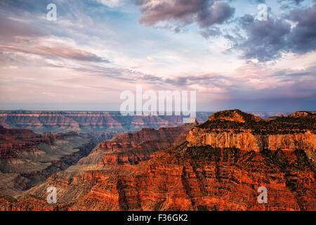 The warmth of sunrise light on the North Rim of Arizona's Grand Canyon National Park from Bright Angel Point.