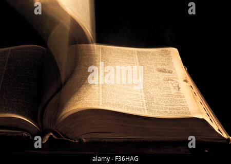 Old book with turning pages Stock Photo