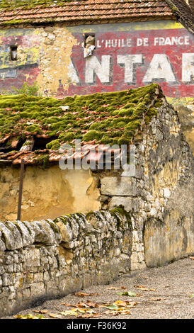 Old stone wall and buildings Stock Photo