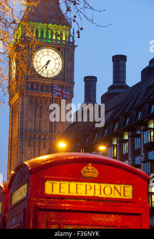 Big Ben Elizabeth Tower clock tower of Houses of Parliament with traditional K6 red telephone box in foreground London England U Stock Photo