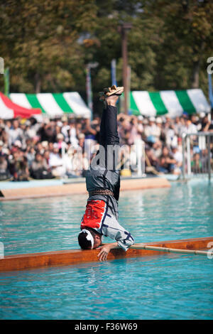 traditional Japanese yukata balancing on square log on water Stock Photo