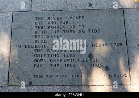 A passage from The Waste Land by  T. S. Eliot set in a paving stone on the Thames Path, Southbank, London, UK. Stock Photo