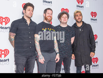 (L-R) Joe Trohman, Andy Hurley, Patrick Stump and Pete Wentz of Fall Out Boy attends the iHeartRadio Music Festival in Las Vegas Stock Photo