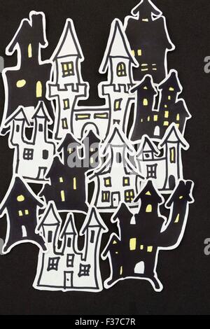 a vertical overhead view of a Halloween scene of some houses Stock Photo