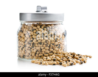 uncooked beans in jar on white background Stock Photo