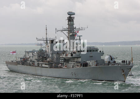 The British Royal Navy Type 23 frigate HMS Sutherland (The Fighting Clan) arriving at Portsmouth, UK on the 17th July 2015. Stock Photo