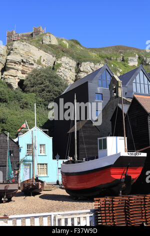 Fishing boats from Hastings Fishermen Museum on Rock-a-Nore and the East Hill Cliff railway in the background, East Sussex, UK Stock Photo