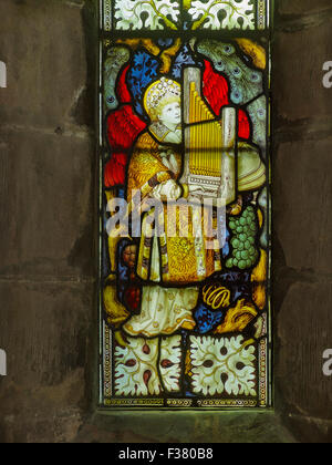 Lichfield Cathedral angel playing organ  window Stock Photo