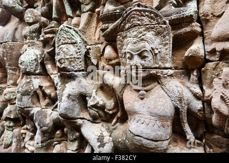 Fragment of bas-relief on Terrace of the Elephants in Angkor Thom temple complex. Angkor Archaeological Park, Siem Reap Province Stock Photo